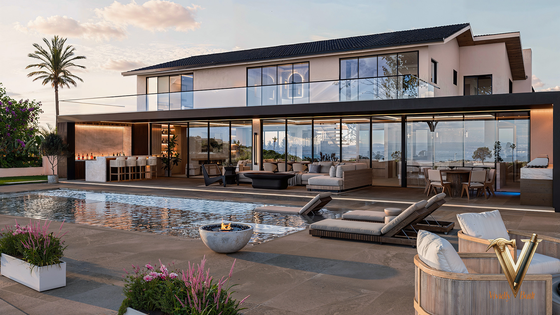 Contemporary hillside estate at dusk with vanishing-edge pool, fire bowl, glass-walled great room and outdoor bar, ocean beyond — Modern Estate, Palos Verdes